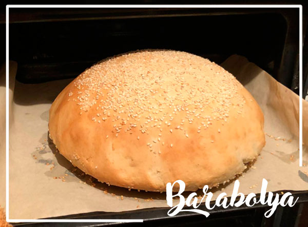 хлеб на сухих дрожжах выпекается в разогретой до 220 градусов духовке, в течение 30 - 40 минут
